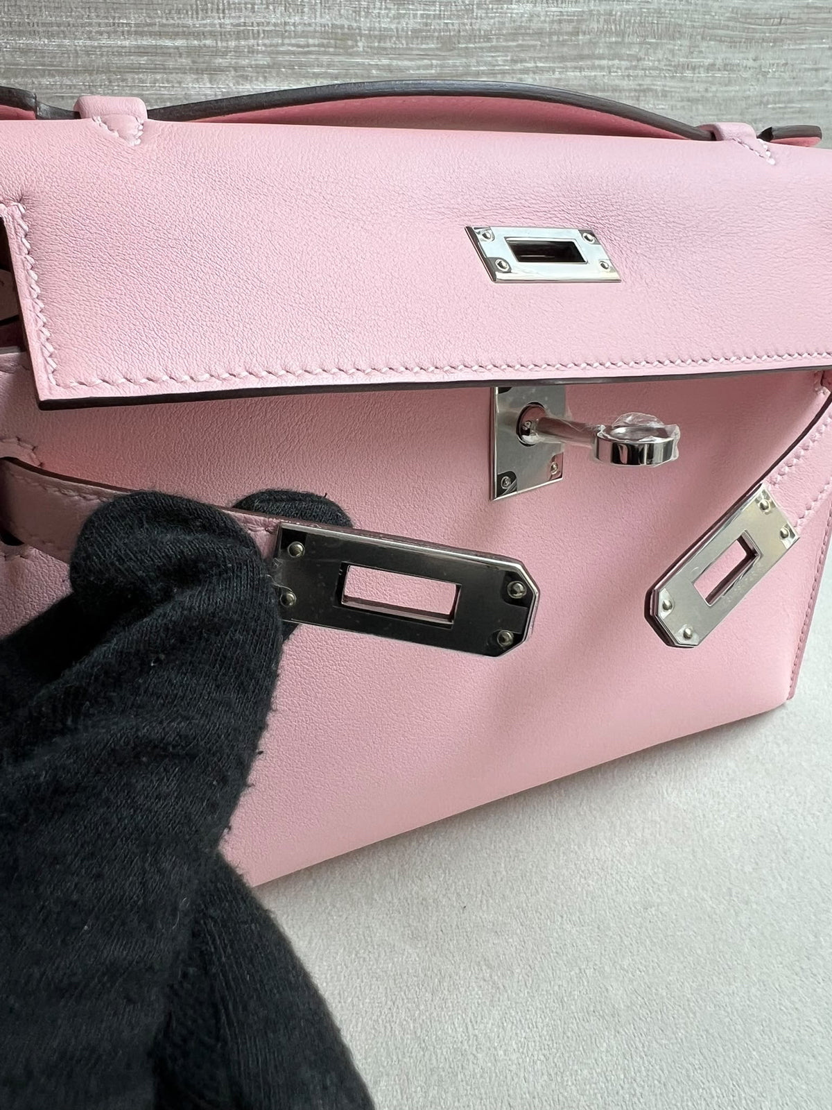 HERMÈS KELLY POCHETTE SWIFT ROSE SAKURA FINITION PALLADIÉE