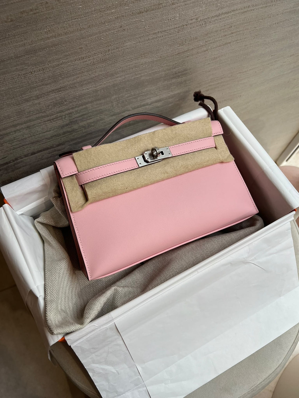 HERMÈS KELLY POCHETTE SWIFT ROSE SAKURA FINITION PALLADIÉE