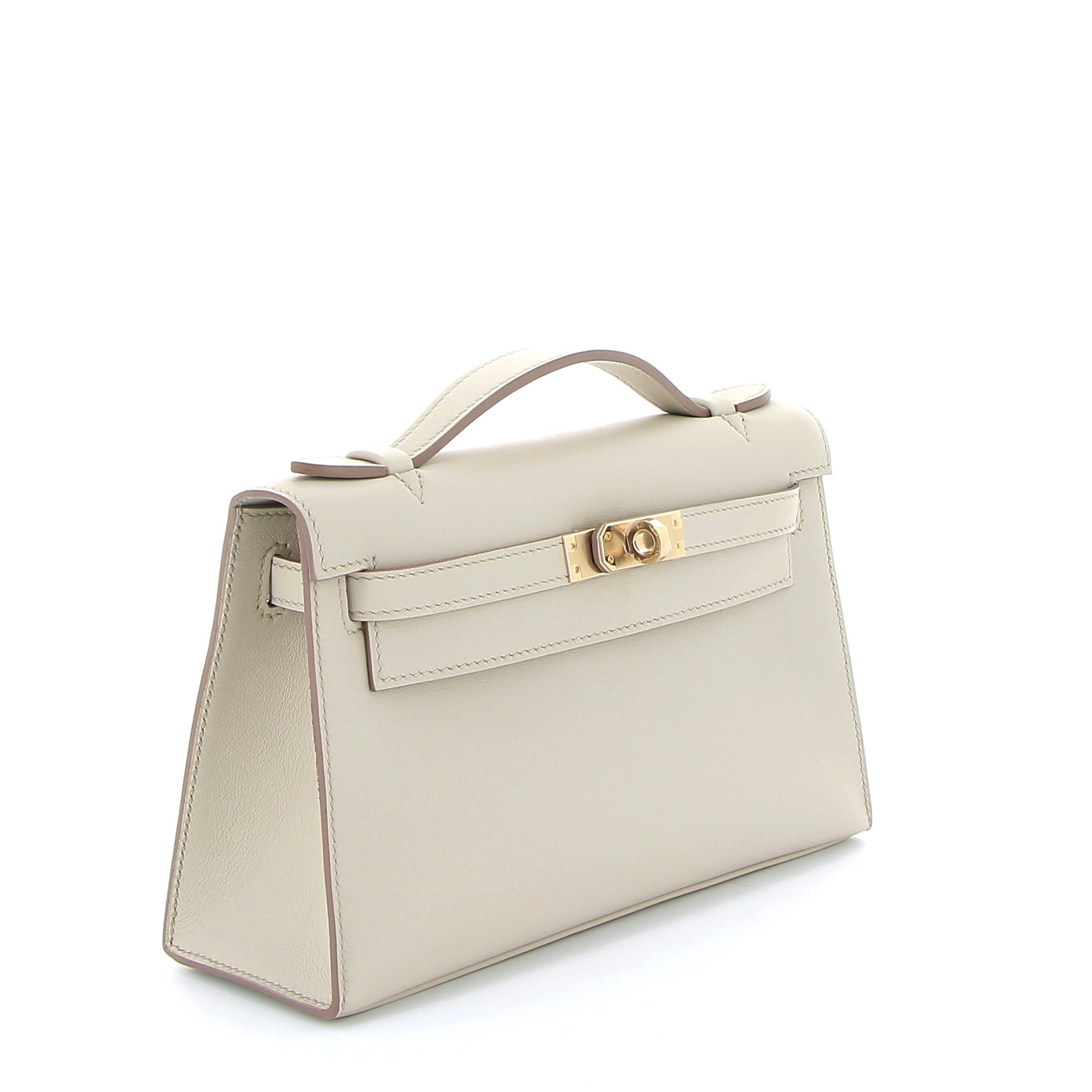 HERMES Kelly Pochette Béton Intérieur Gris Perles Cuir Swift Finition Or Jaune