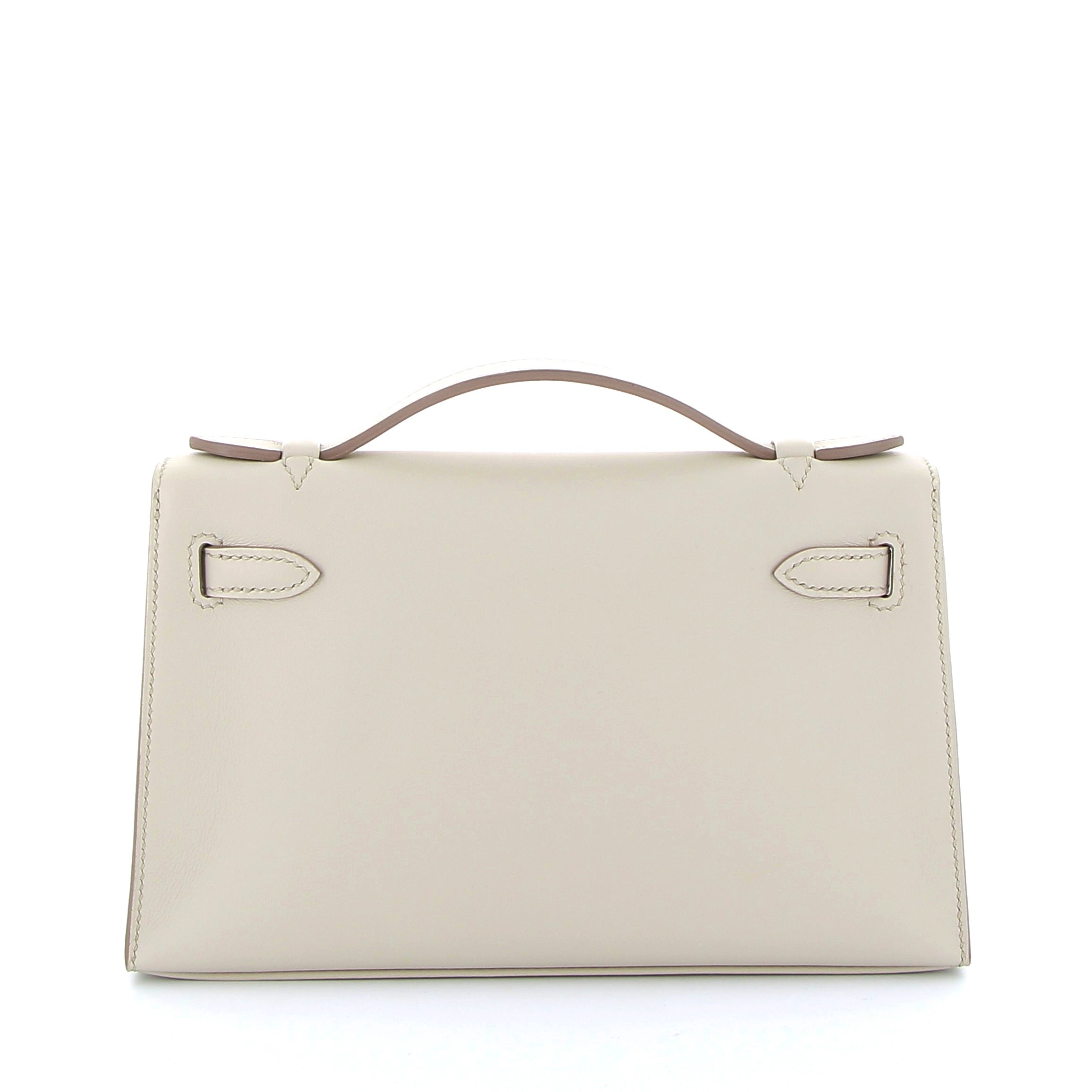 HERMES Kelly Pochette Béton Intérieur Gris Perles Cuir Swift Finition Or Jaune