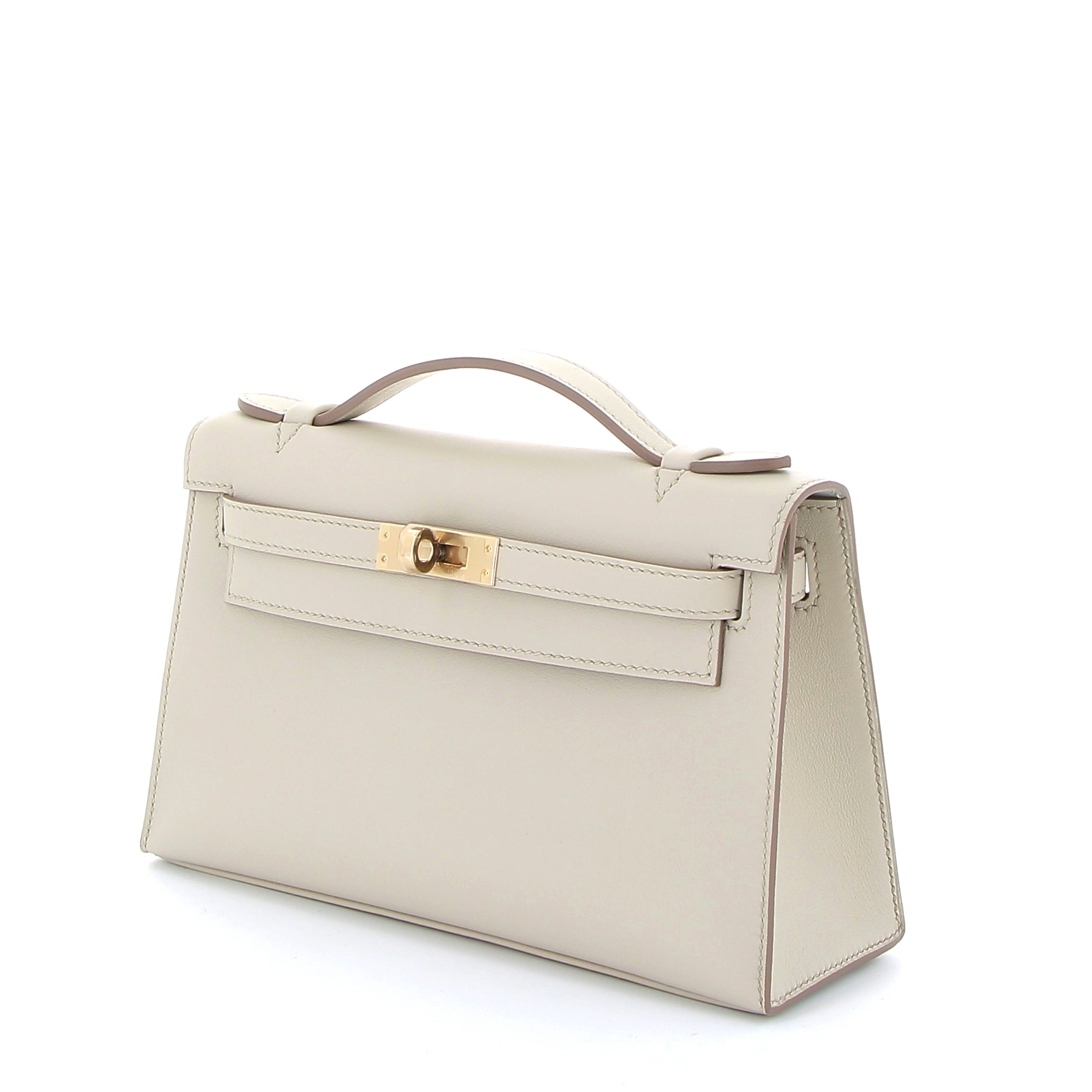 HERMES Kelly Pochette Béton Intérieur Gris Perles Cuir Swift Finition Or Jaune