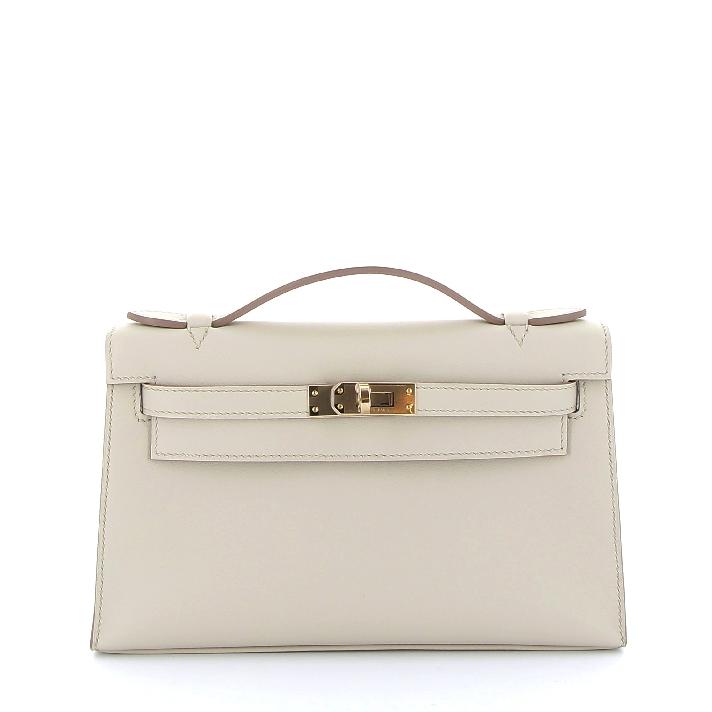HERMES Kelly Pochette Béton Intérieur Gris Perles Cuir Swift Finition Or Jaune